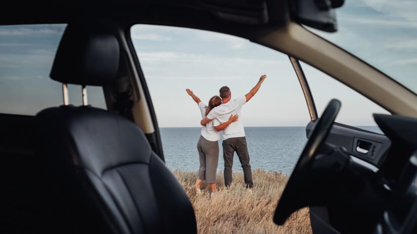 Couple outside car