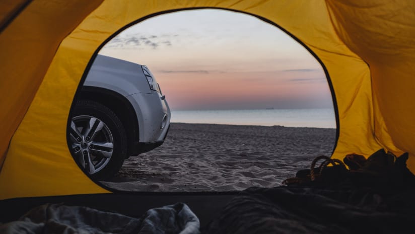 Car outside tent