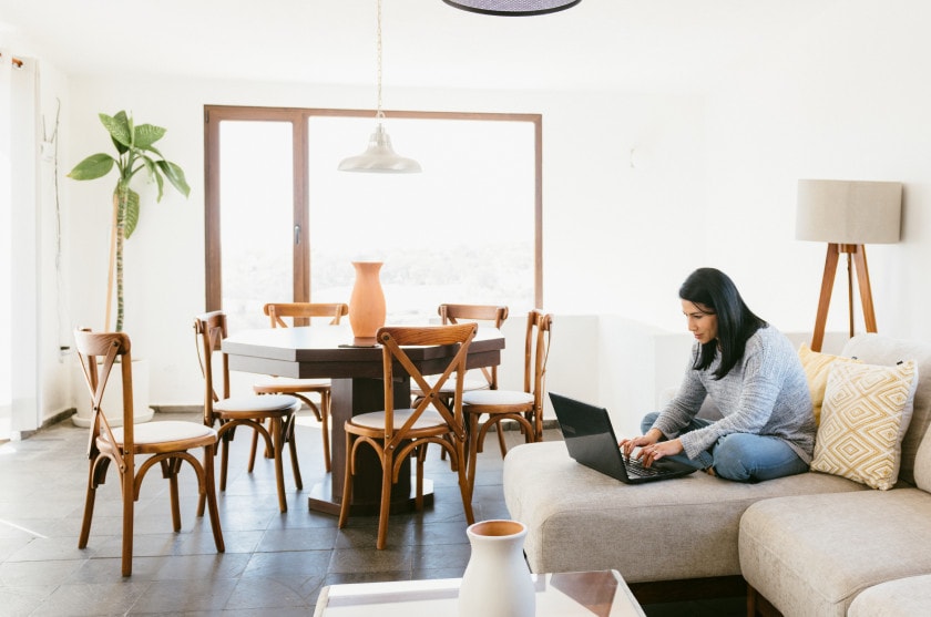 Girl on laptop in home