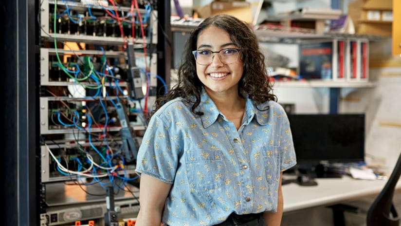 Woman standing in front of server