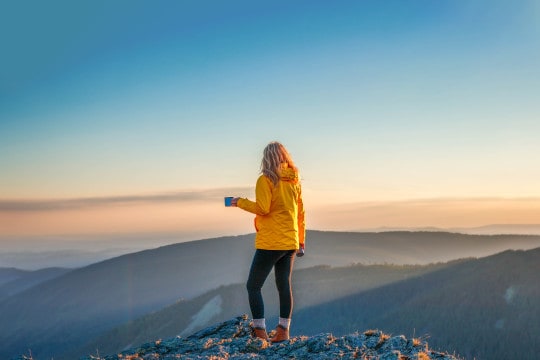 Woman hiking on mountain