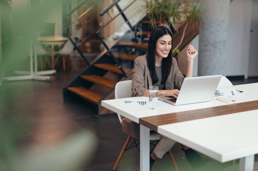 Woman sitting at computer