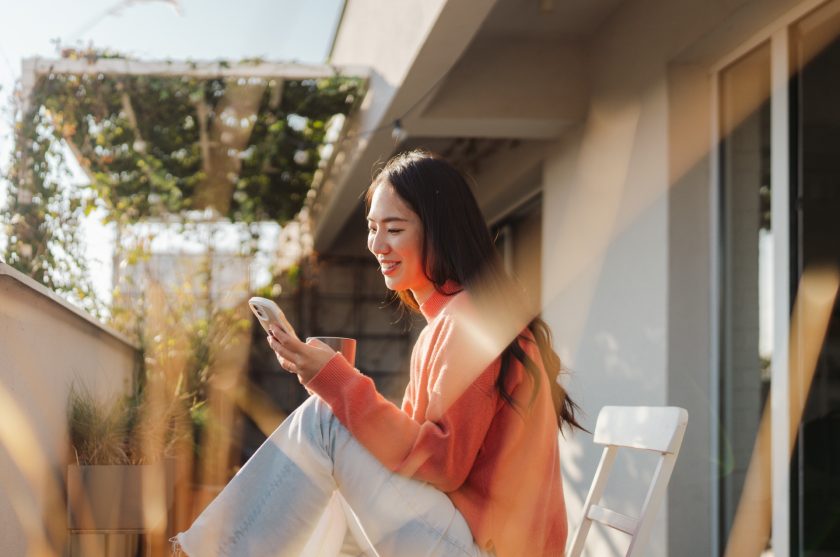 Woman on phone outdoors