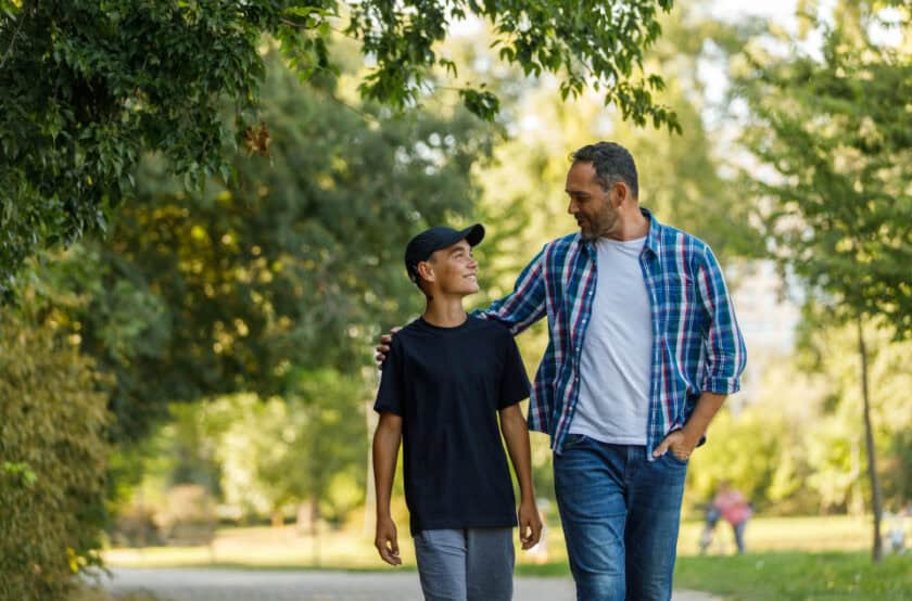 Father and son walking
