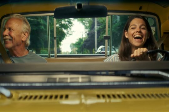 Father and daughter driving