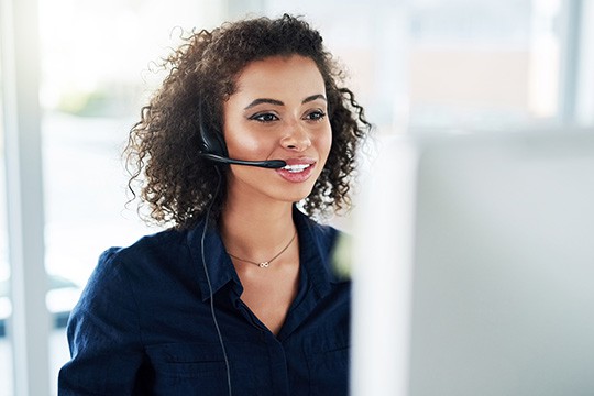 Woman on headset in call center