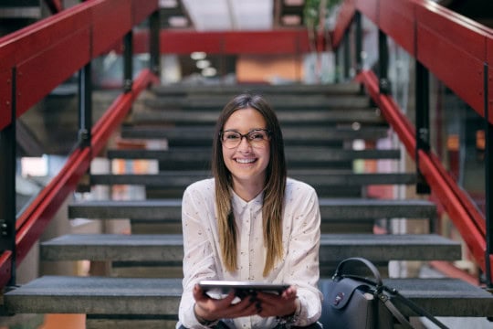 Girl on school stairs